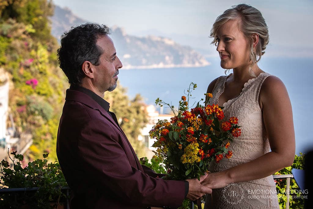 romantic moment during an elopement ceremony in Amalfi Coast