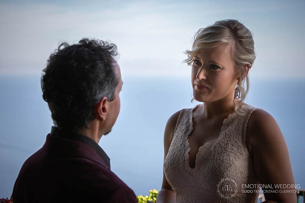 wedding couple looking each other during a symbolic ceremony in Amalfi Coast