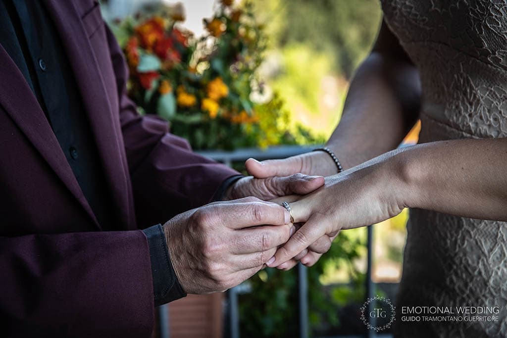 groom giving his ring to the bride at their elopement in Amalfi Coast