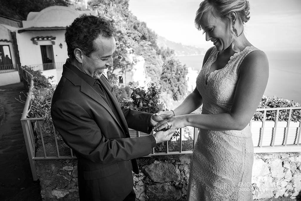 wedding couple exchanging rings at a symbolic elopement ceremony in Amalfi Coast