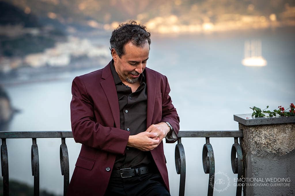 a groom lokking at his wedding ring at an elopement on the Amalfi Coast