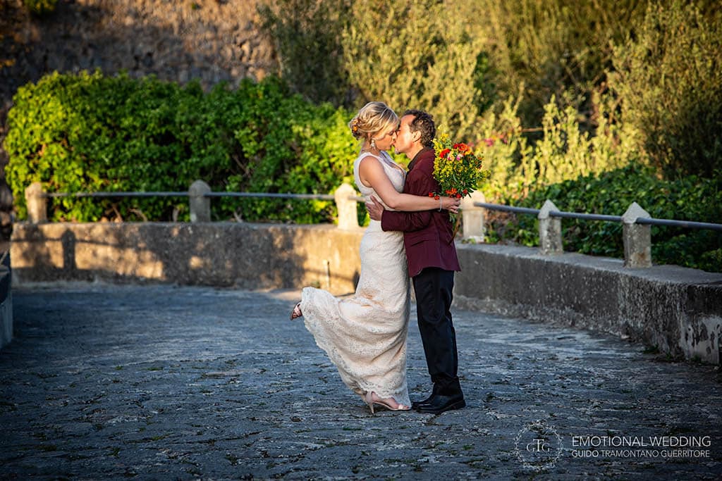 passionate kiss of bride and groom elopement in Amalfi Coast