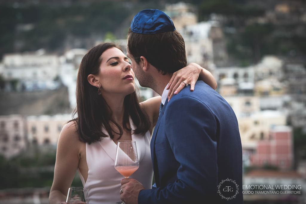candid shot of bride and groom in Positano