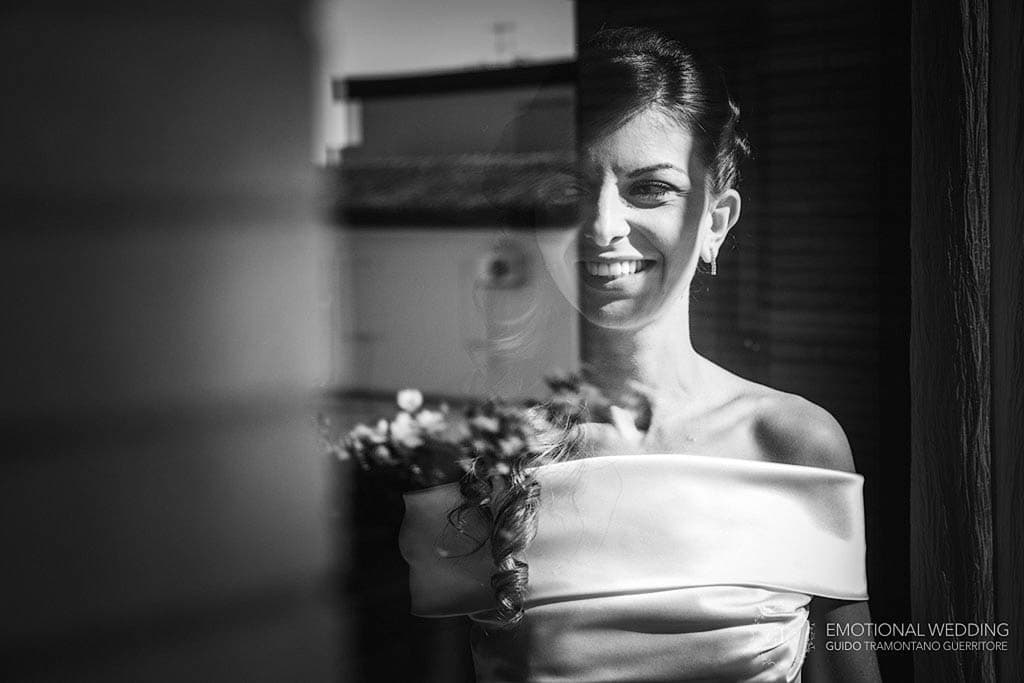 candid of a bride getting ready shot by wedding photographer in apulia