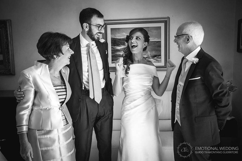 bride and her family cheering after getting ready