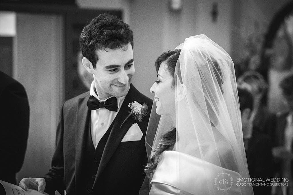 candid shot of a wedding couple during the ceremony taken by apulia wedding photographer