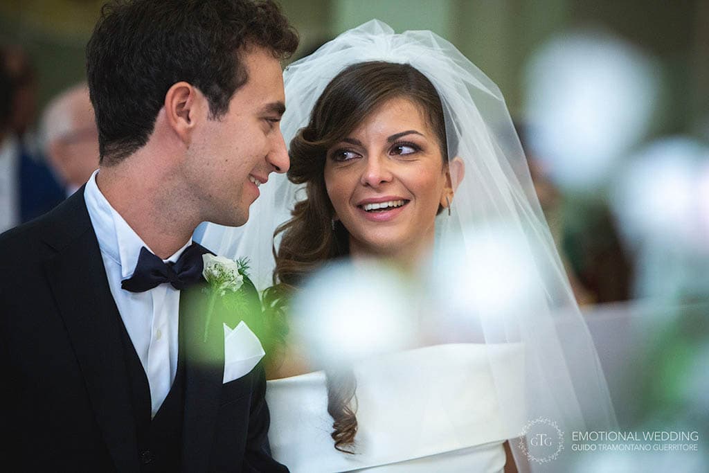candid portrait of bride and groom taken by a wedding photographer in apulia