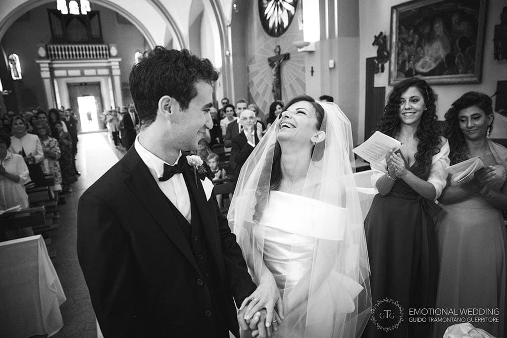 bride laughing during a wedding ceremony in apulia