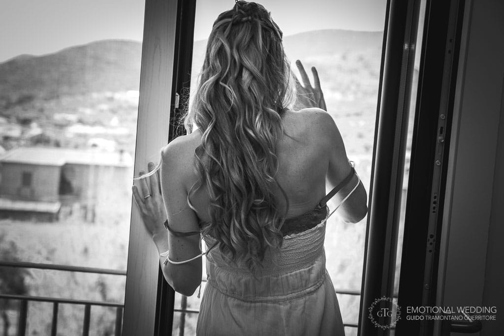 bride looking out of the windows