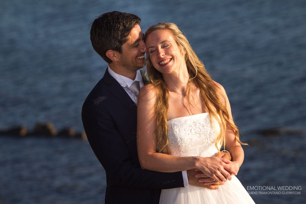 candid portrait of a wedding couple at Punta Licosa in Cilento national park