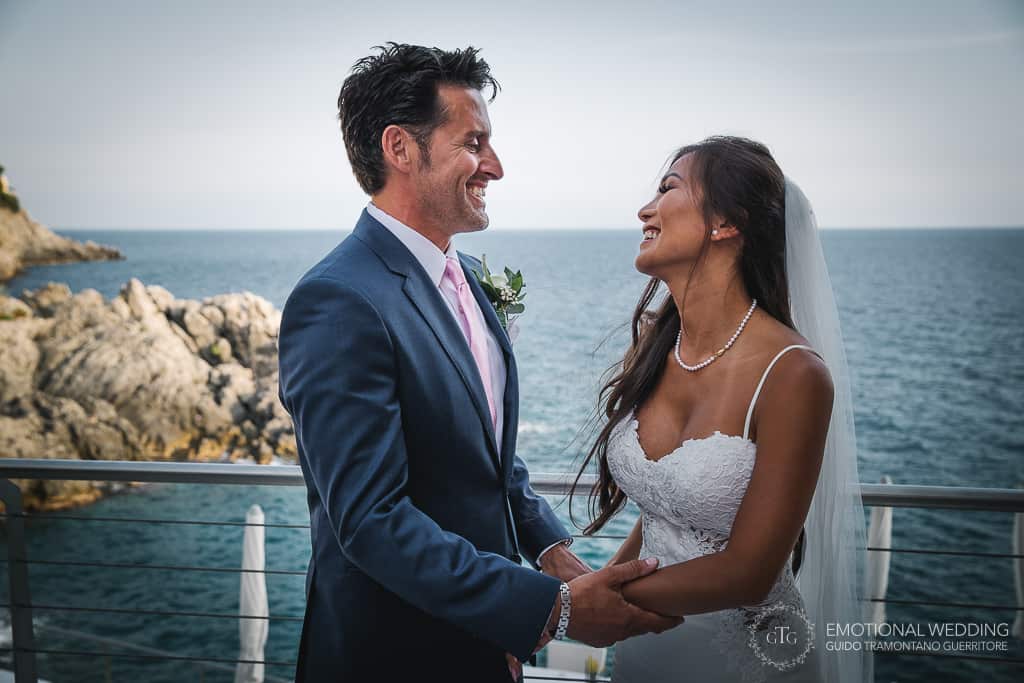 mixed wedding couple smiling at their ceremony in Amalfi coast