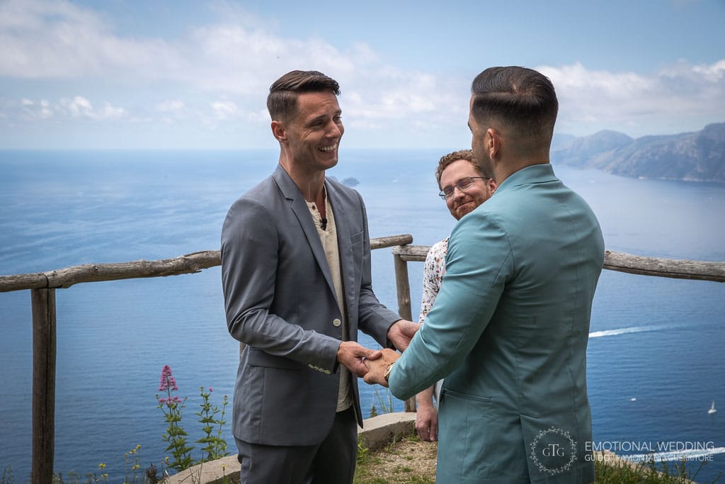 gay couple and officiant at a same sex wedding in Amalfi Coast path of gods