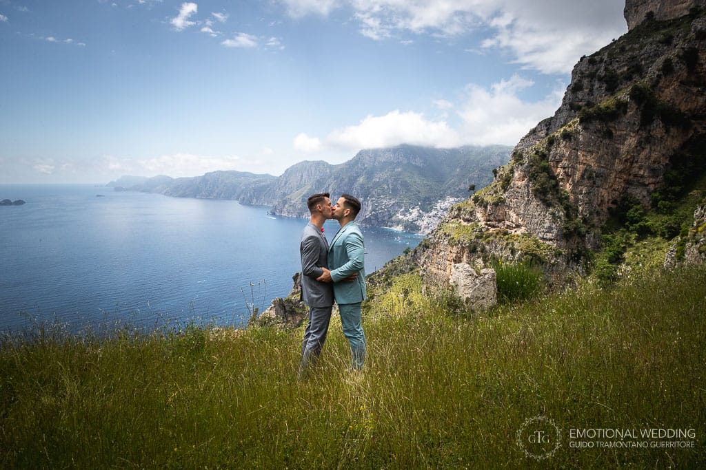 gay couple kissing and Amalfi Coast view from above