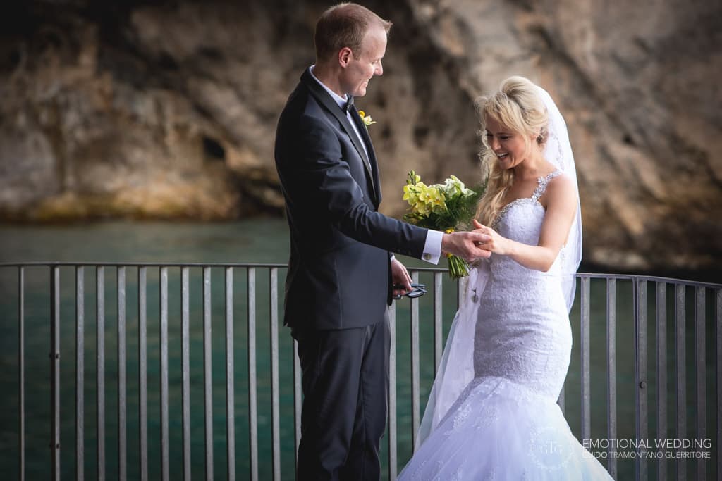 wedding couple candid at fjord of Furore in Amalfi coast