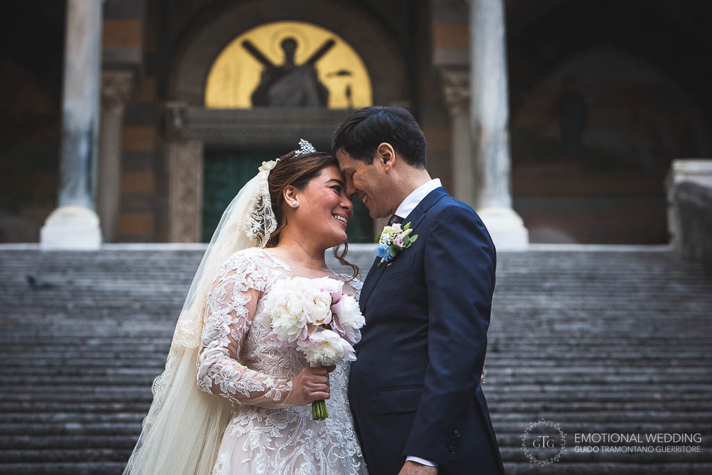 wedding couple portrait on the steps of the amalfi cathedral