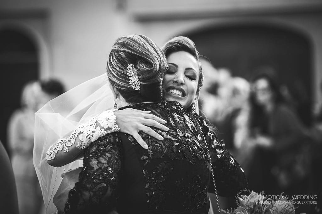 bride hugs her mother after the ceremony at a destination wedding