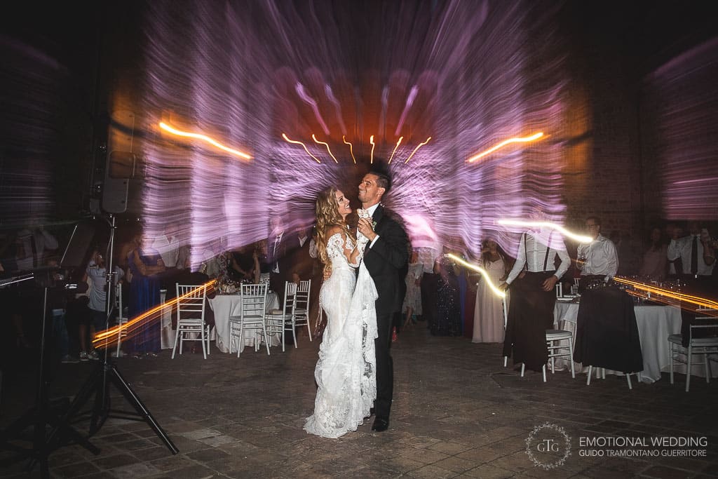 bride and groom first dance at castello di tabiano in fidenza