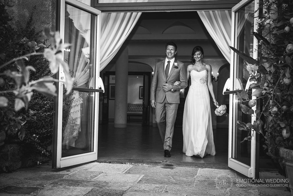 wedding couple entering the party at hotel caruso in ravello, italy