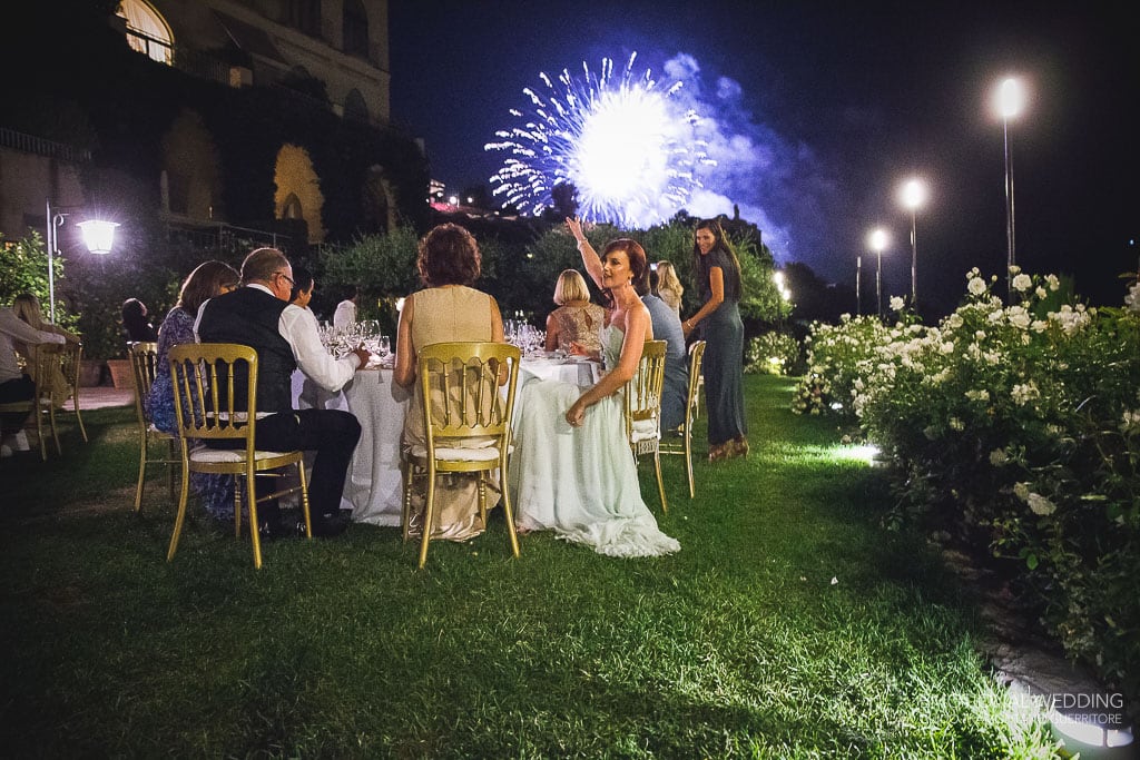 fireworks seen from the garden of hotel caruso in ravello at an Italian wedding