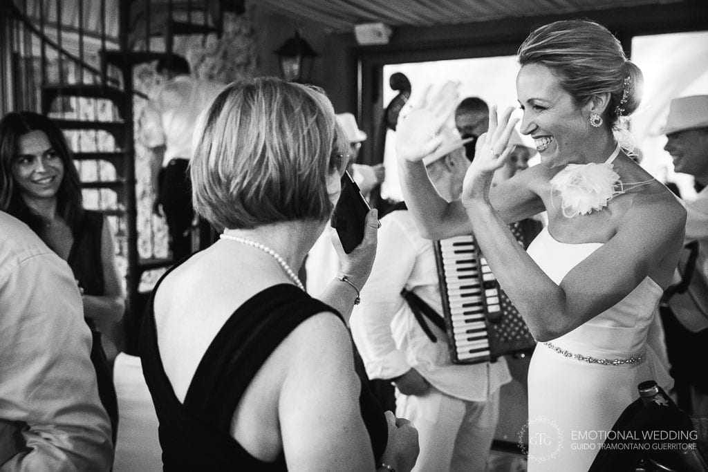 fun moment of the bride at her wedding party