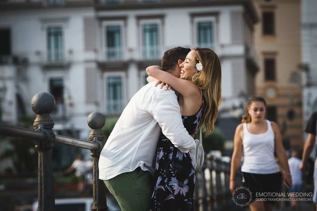 candid shot of a couple at their marriage proposal in amalfi