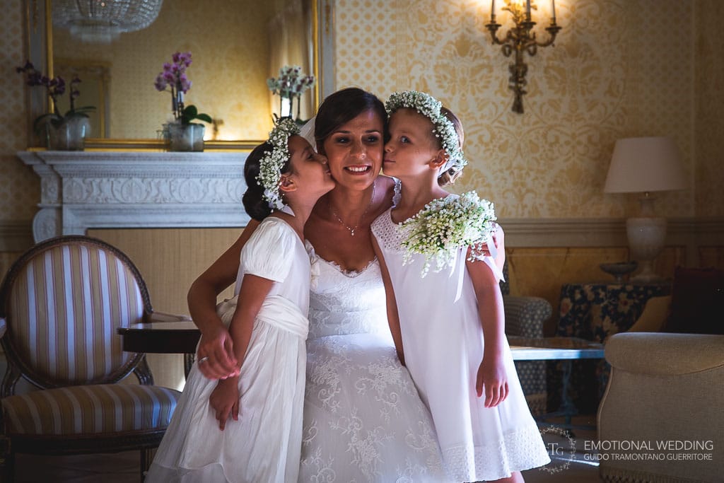 flower girls kissing the bride at hotel Belmont Caruso in ravello