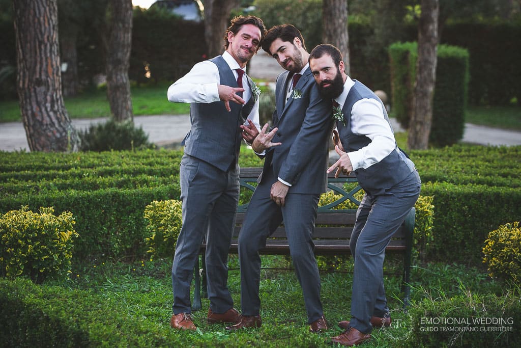 best men and groom in the gardens of villa oasi olimpia at a wedding in Sorrento