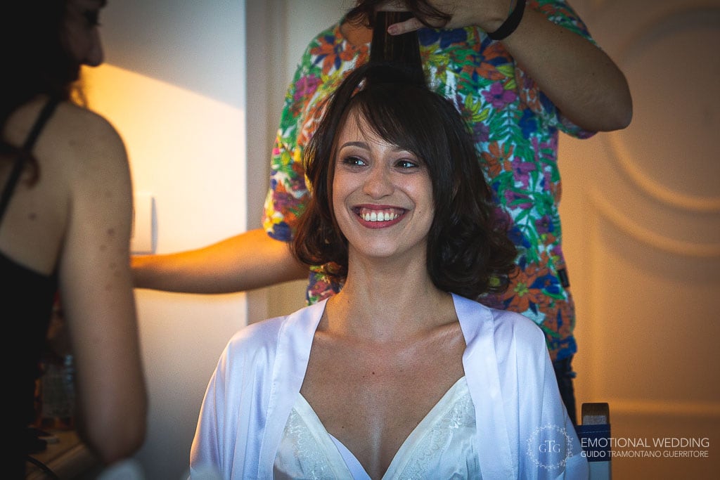 bride smiling while getting ready for her wedding in praiano, Amalfi Coast
