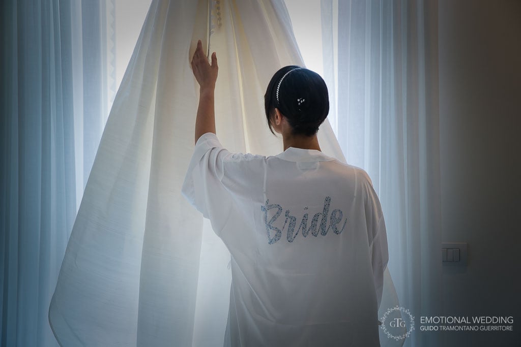 bride checks her wedding dress at hotel tramonto d'oro in praiano