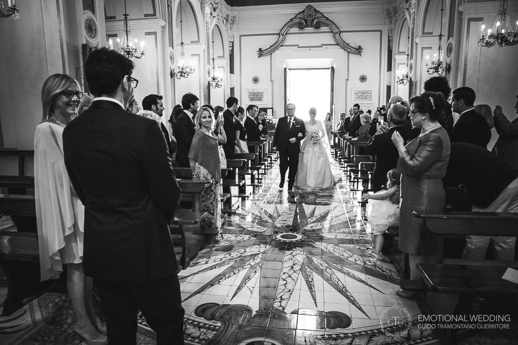 bride and father walking down the aisle at San Gennaro church in praiano