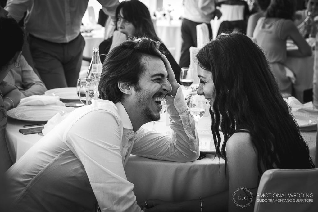 guests laughing at wedding reception at hotel tramonto d'oro in Praiano