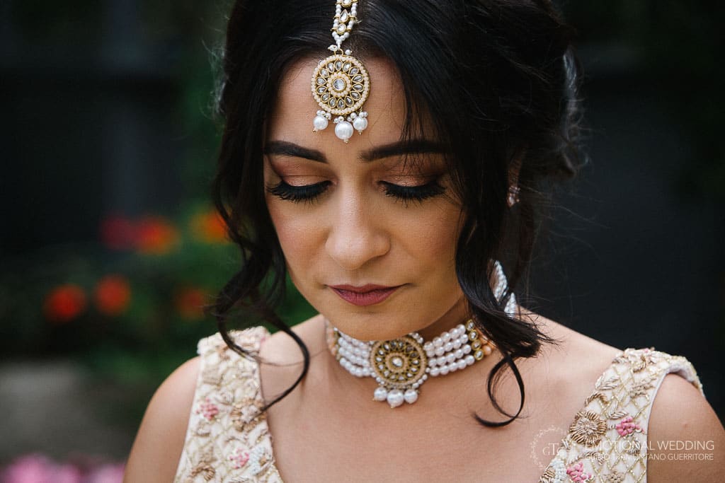 candid portrait of an indian bride at a wedding inravello