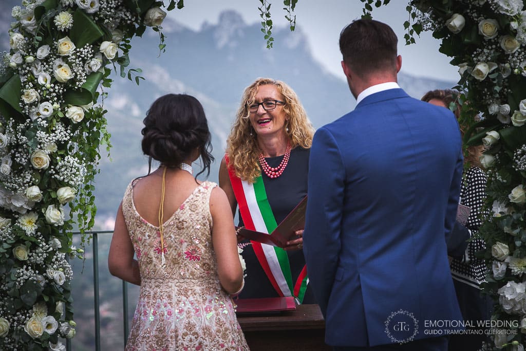 wedding couple and officiant at principessa di Piemonte town hall in ravello