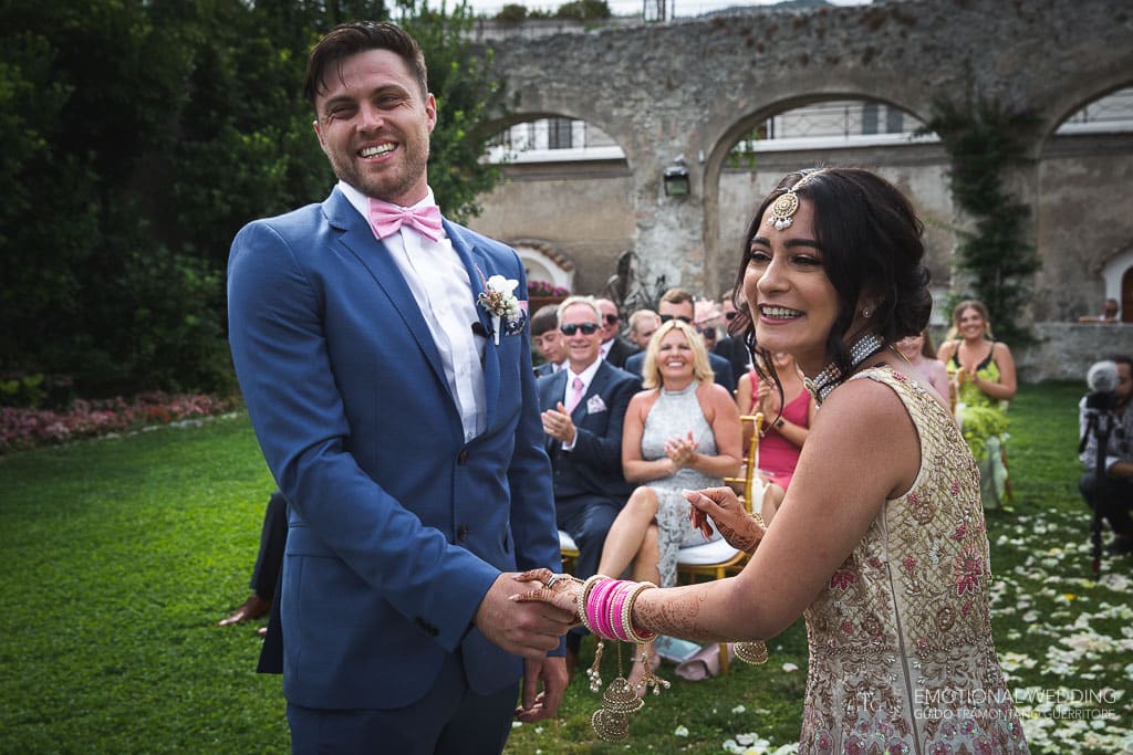 wedding couple smiling during ceremony at principessa di Piemonte gardens in ravello