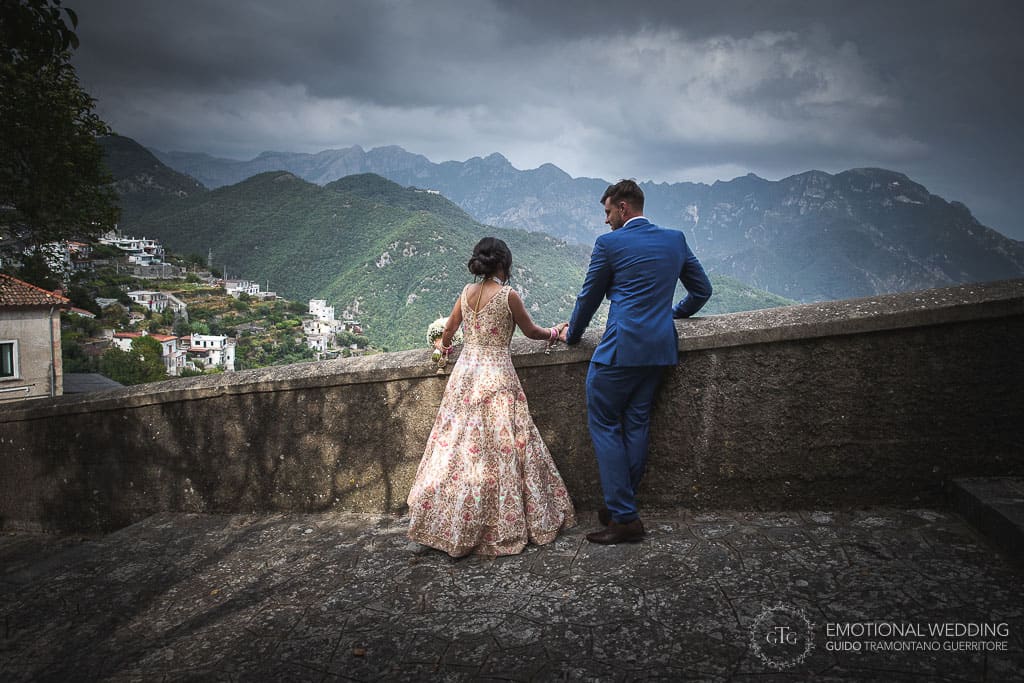 wedding couple enjoying a view from a terrace in ravello