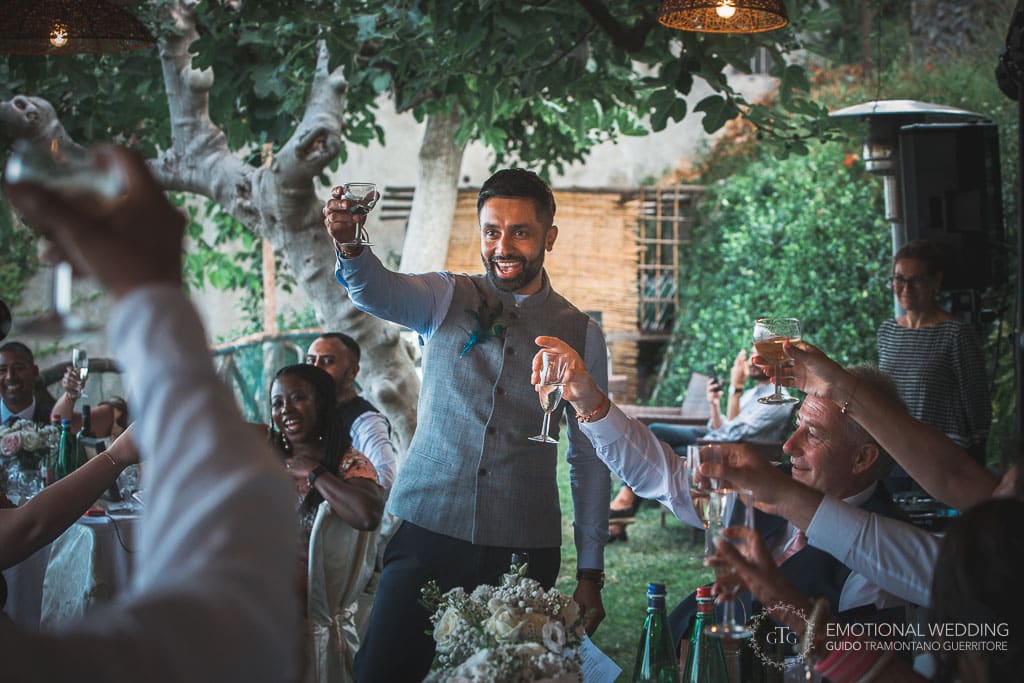 brother of the bride toasting after his speech at a wedding in ravello
