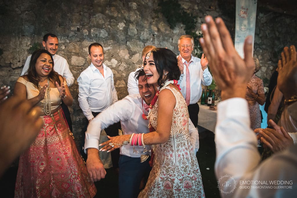 hindu bride and English groom dancing at a wedding party in ravello