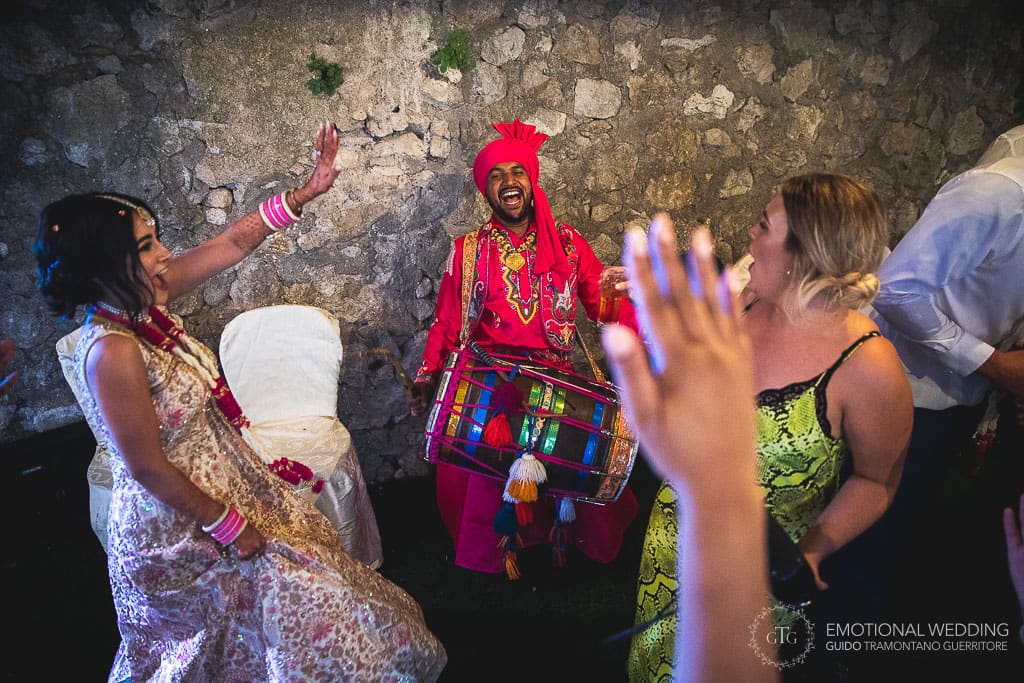 DHOL player and indian bride at a wedding party in ravello