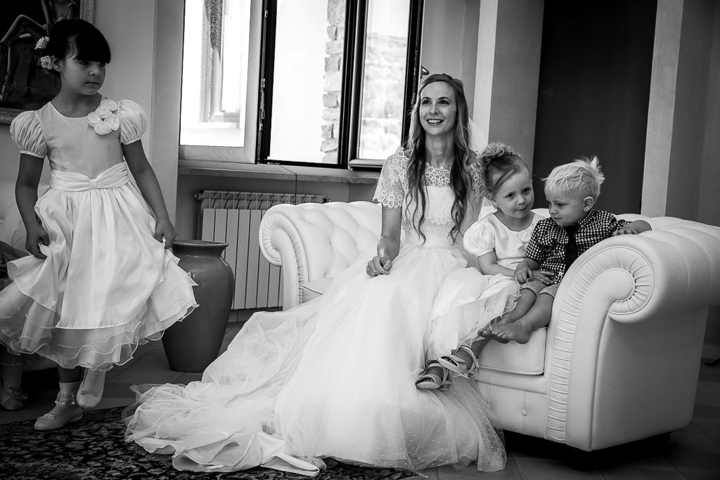 bride and children on a sofa