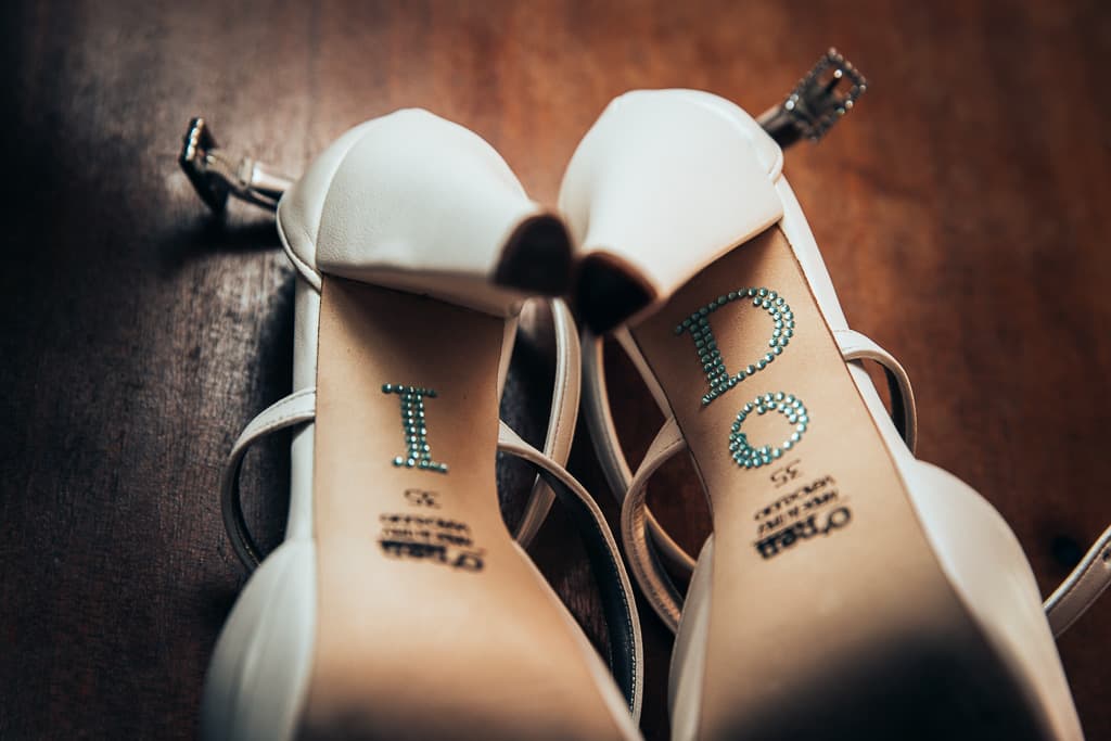 wedding shoes with the inscription I do