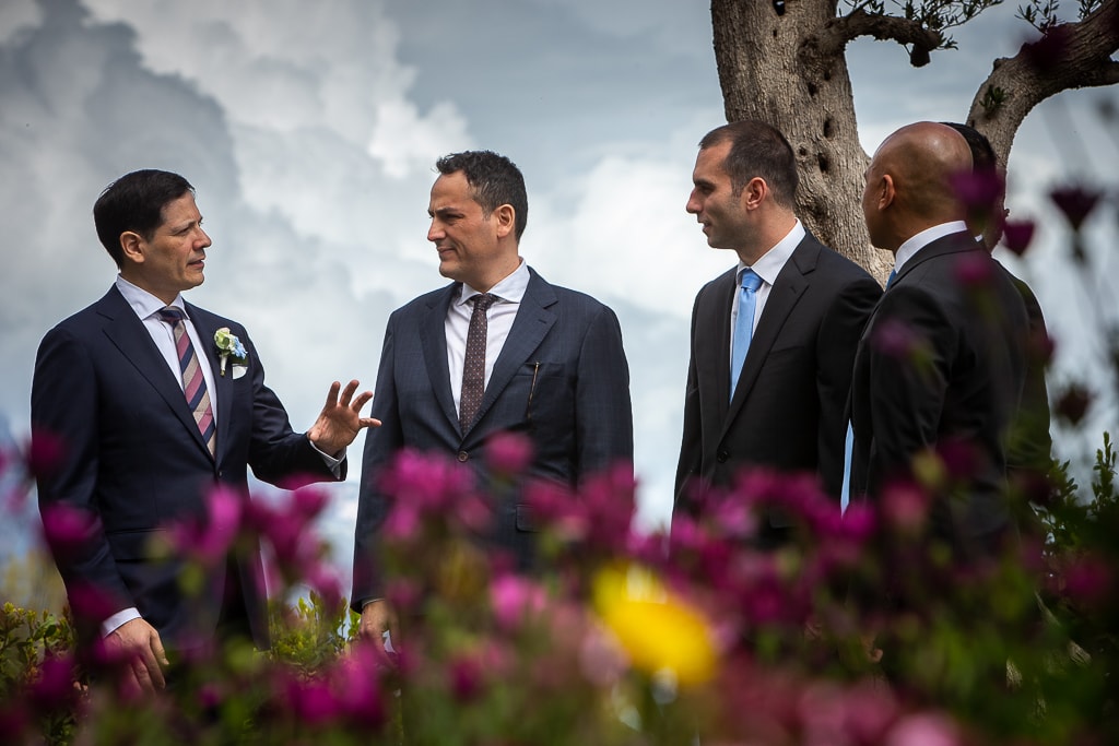 groom talking with his friends