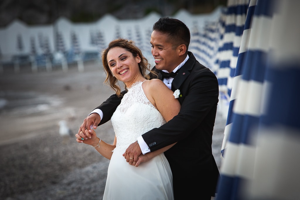 a wedding couple on a beach in amalfi coast