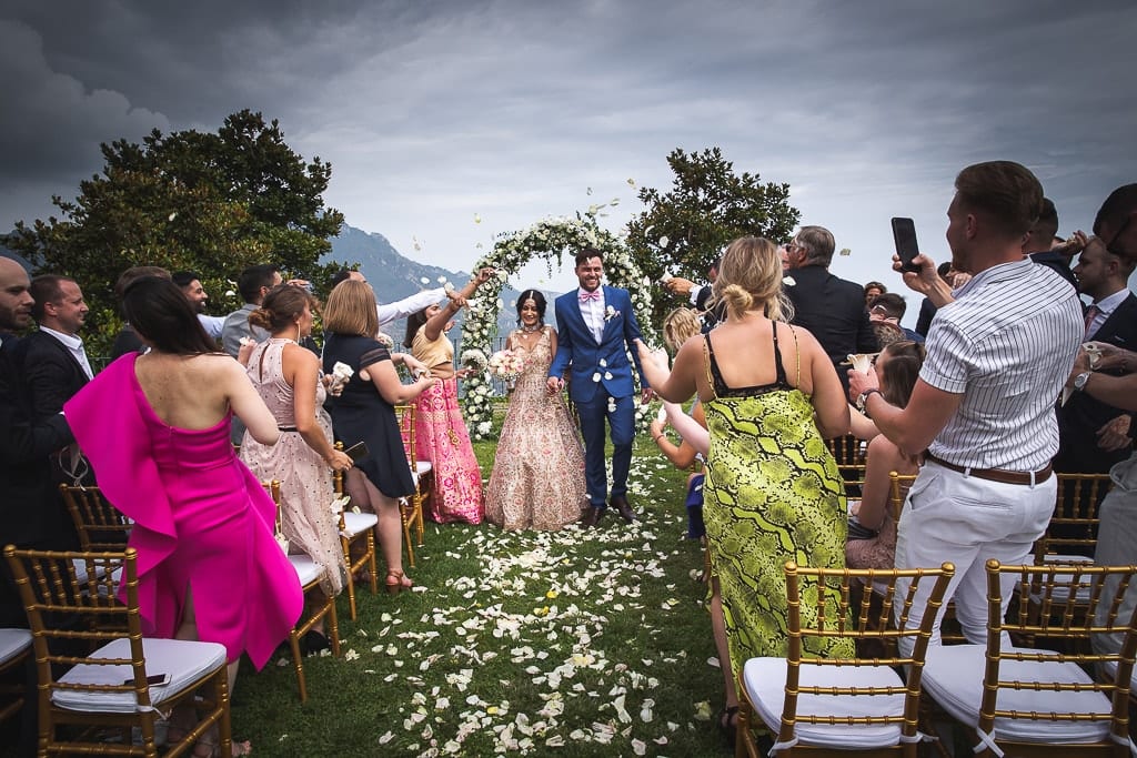 wedding couple exit toss at principessa di piemonte town hall garden in ravello amalfi coast