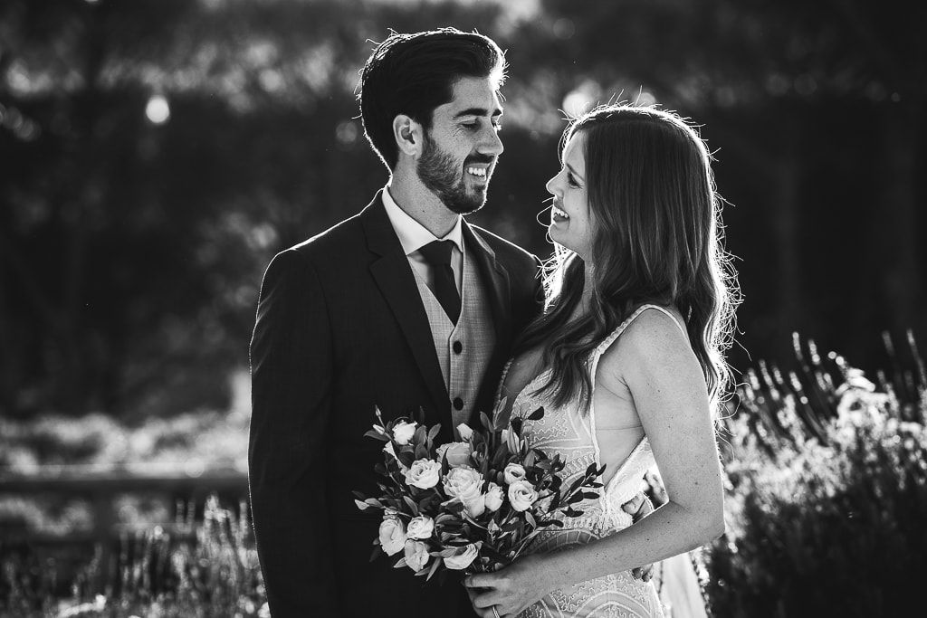 wedding couple looking at each other and smiling