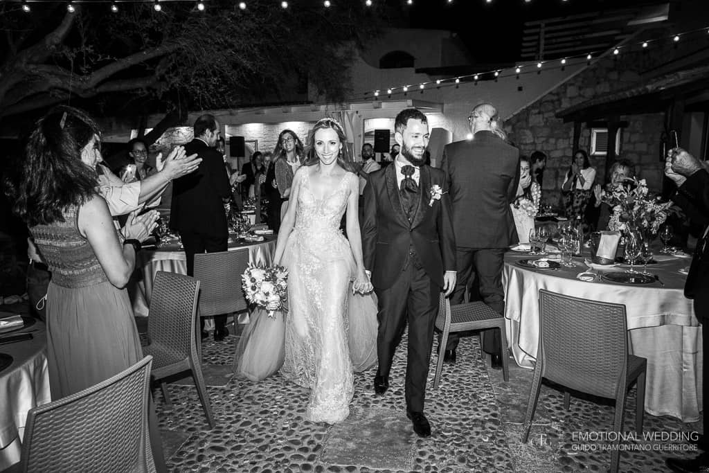 bride and groom entering reception at a wedding in puglia
