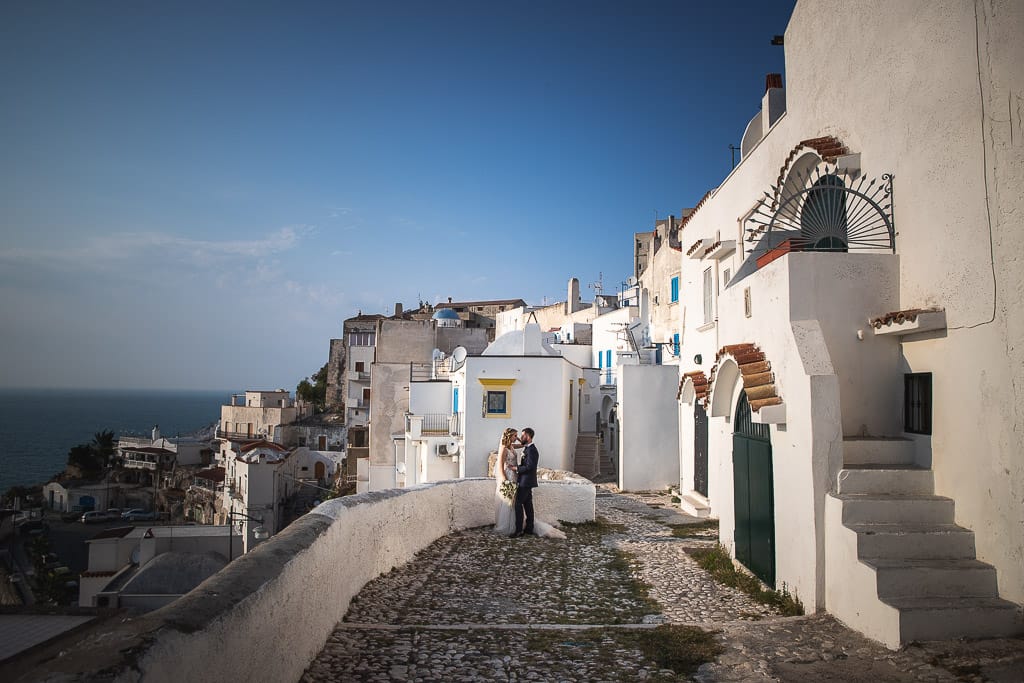 a wedding couple in the town of peschici in apulia, italy