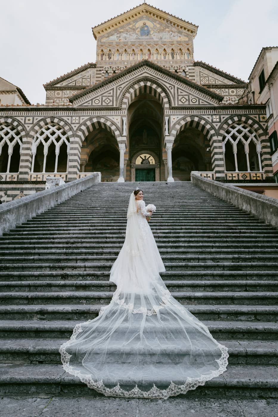 a bride on the staircase of the Amalfi cathedral.