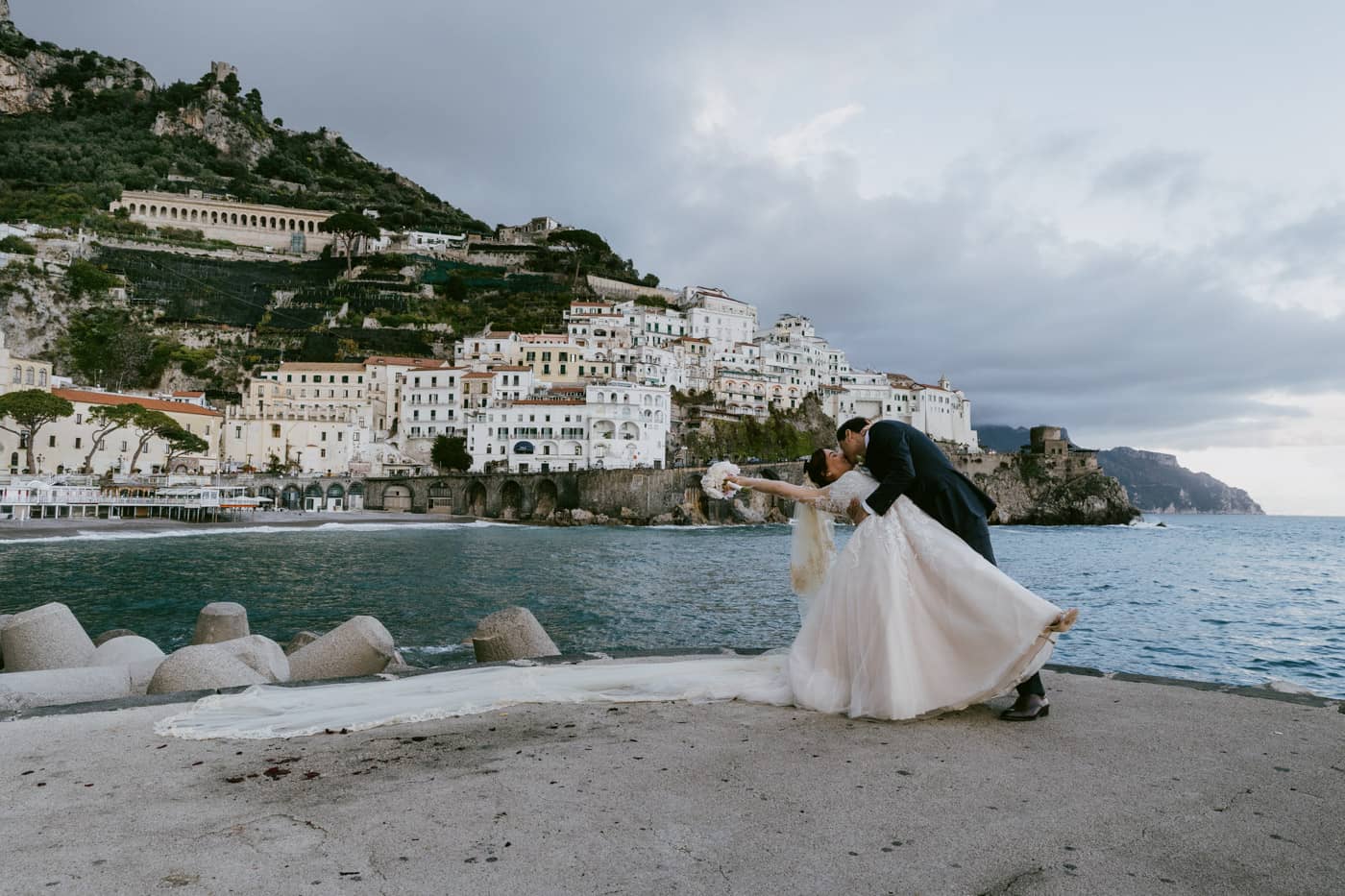 wedding couple on the Amalfi pier, one of the most beautiful Amalfi Coast wedding venues