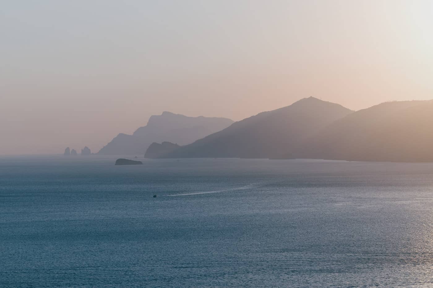 Beautiful coastal view from the village of Praiano at sunset — Praiano destination wedding location.