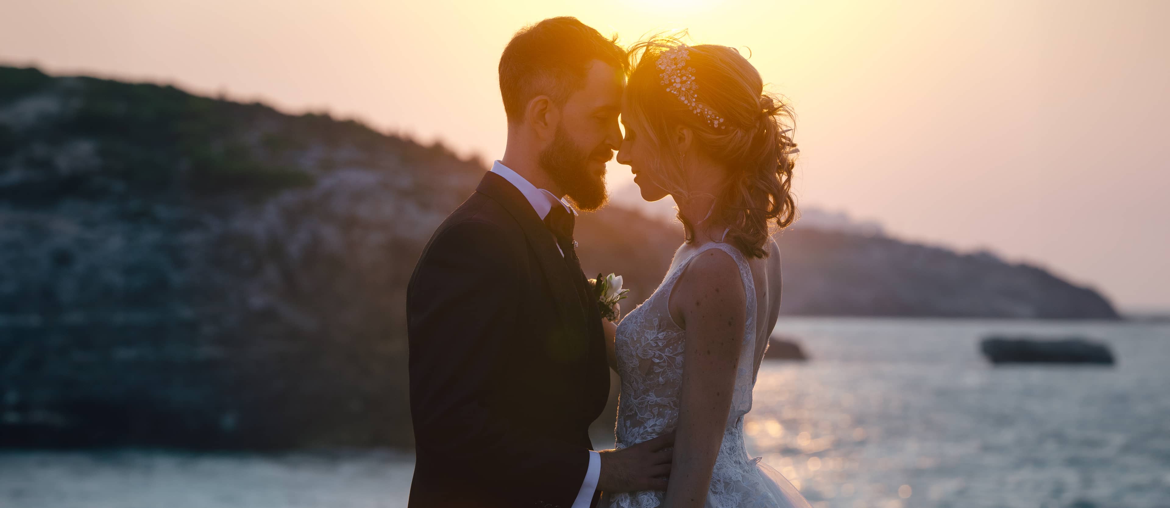 shot of a wedding couple and sunset in gargano national park taken by a puglia wedding photographer
